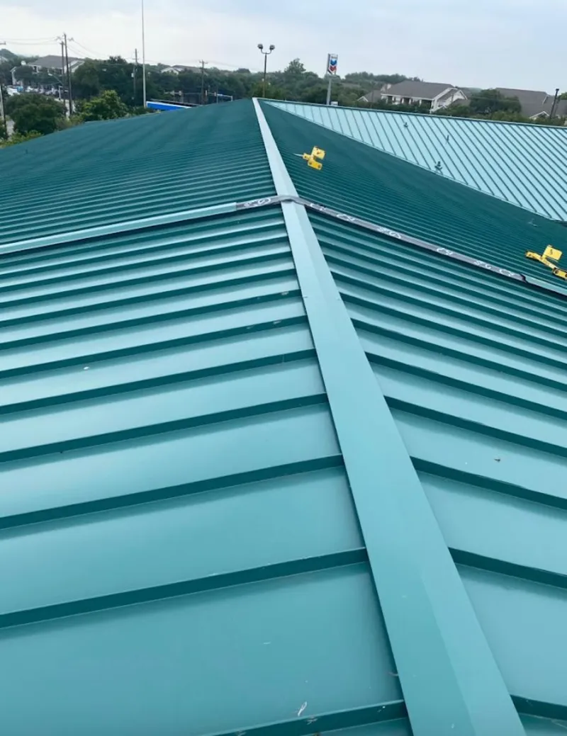 Green commercial metal roof ridge and valley for Metal Roof Repair in Unity