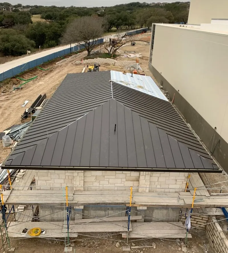 Metal roof new construction with scaffolding in Unity